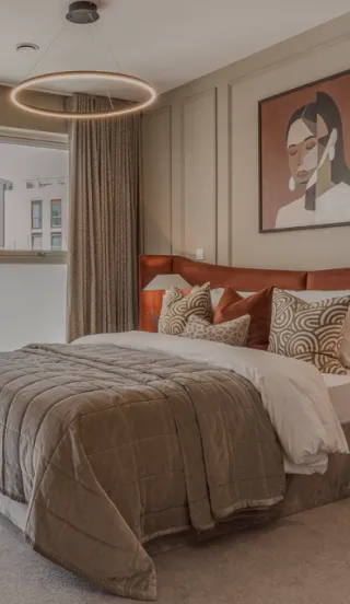 Darker wide shot of principal bedroom